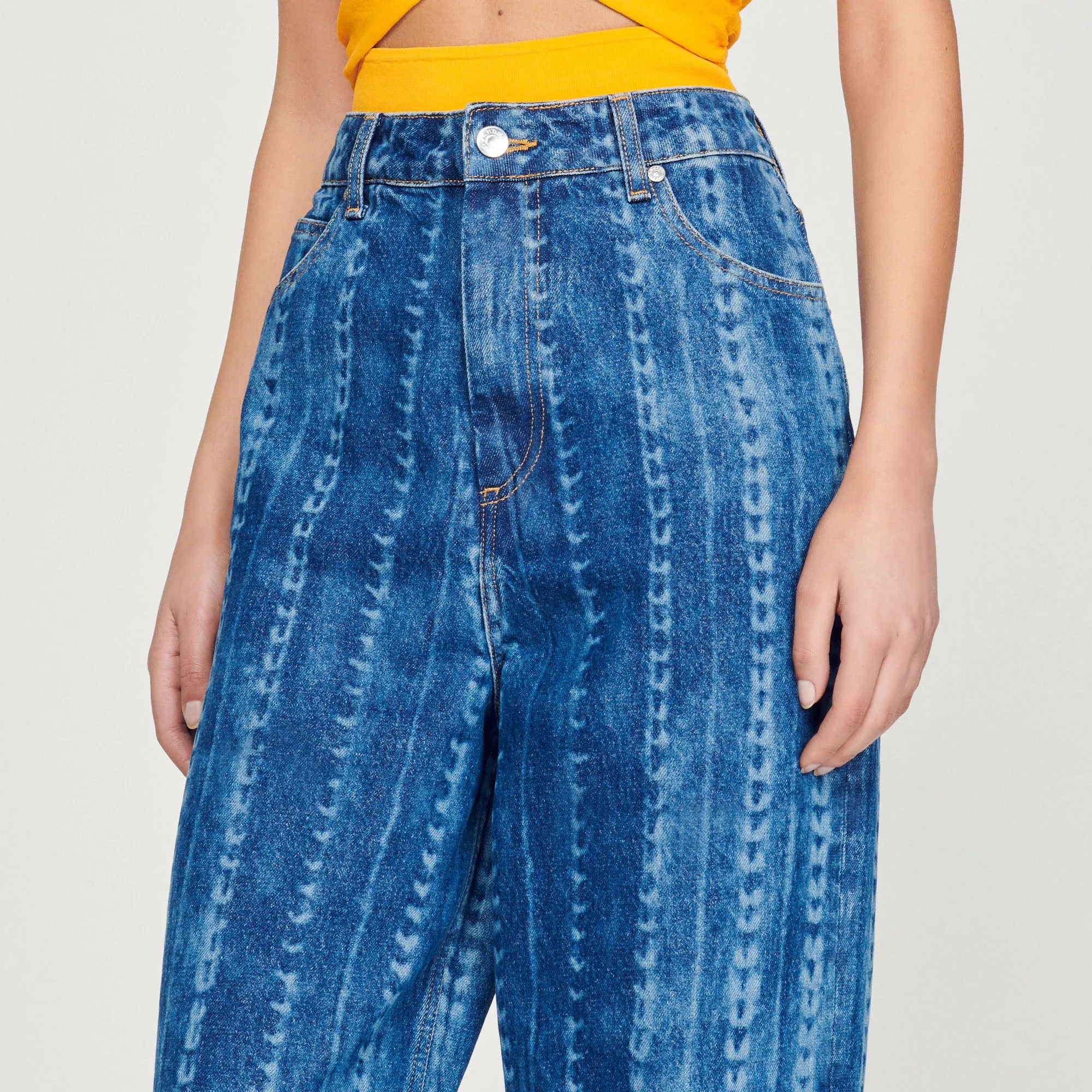 Jean à motifs délavés